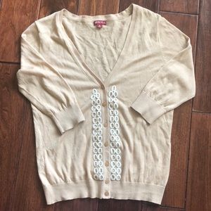 Tan button down cardigan. Never worn